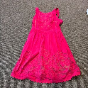 Moulinette Soeurs Vibrant Pink women’s dress. With floral design.